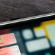 The Adonit Neo Pro stylus magnetically attached to an iPad and charging.